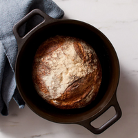 Loaf of bread baked in a Field Company cast iron Dutch oven, top view